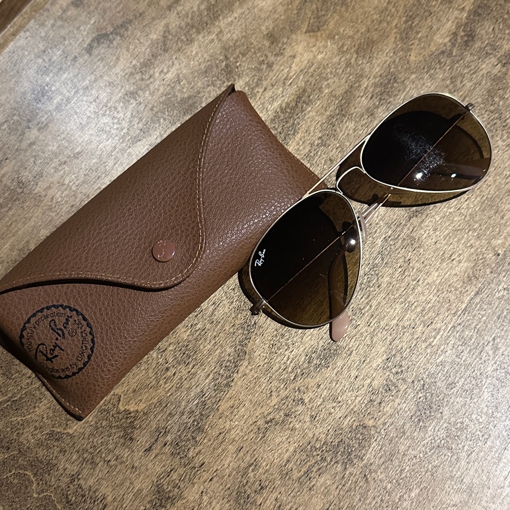 RayBan aviator gold sunglasses- 
Good shape… but left lens a little scratched…
